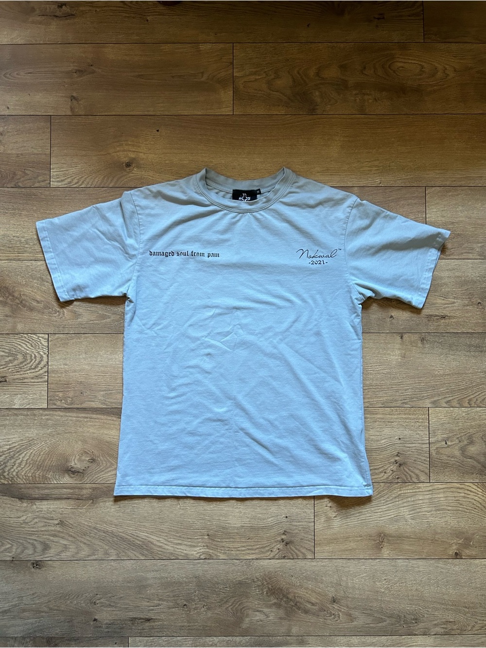 Nokwal Streetwear Light Blue Graphic Tee With Logo On The Back